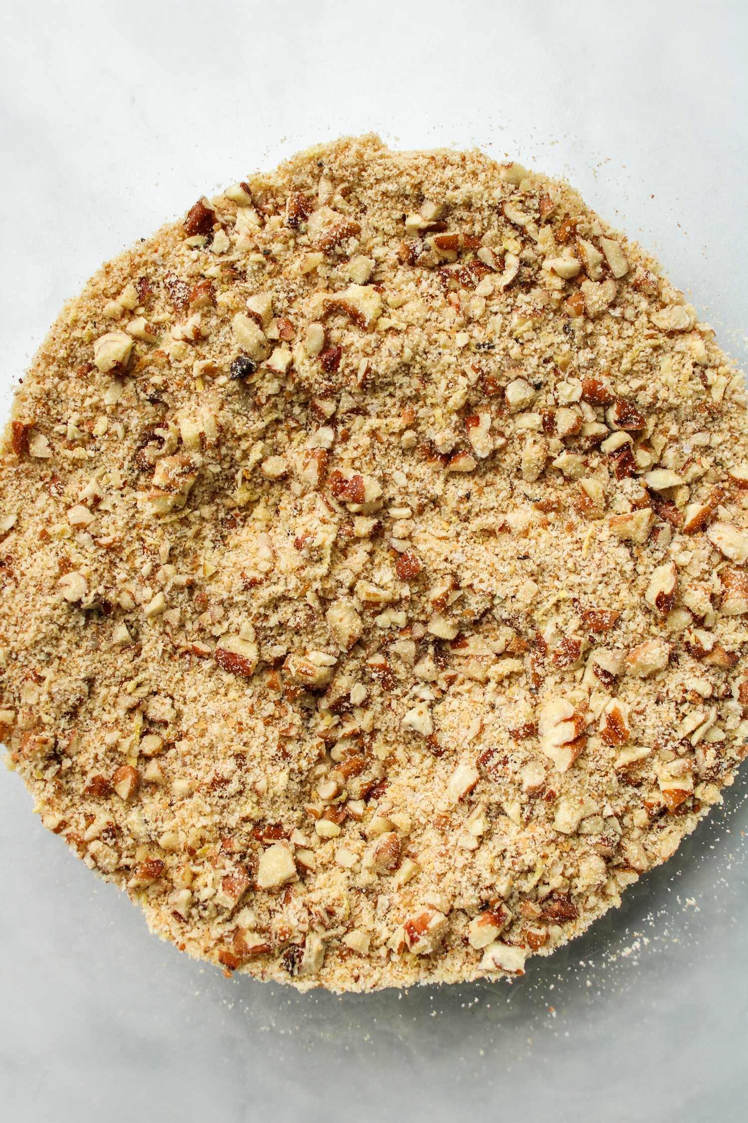 pecan and breadcrumb mixture in a glass bowl