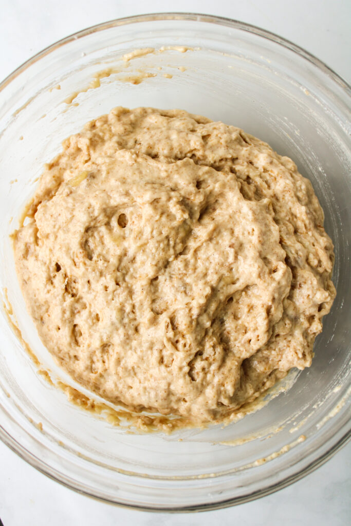 banana bread batter in a glass bowl