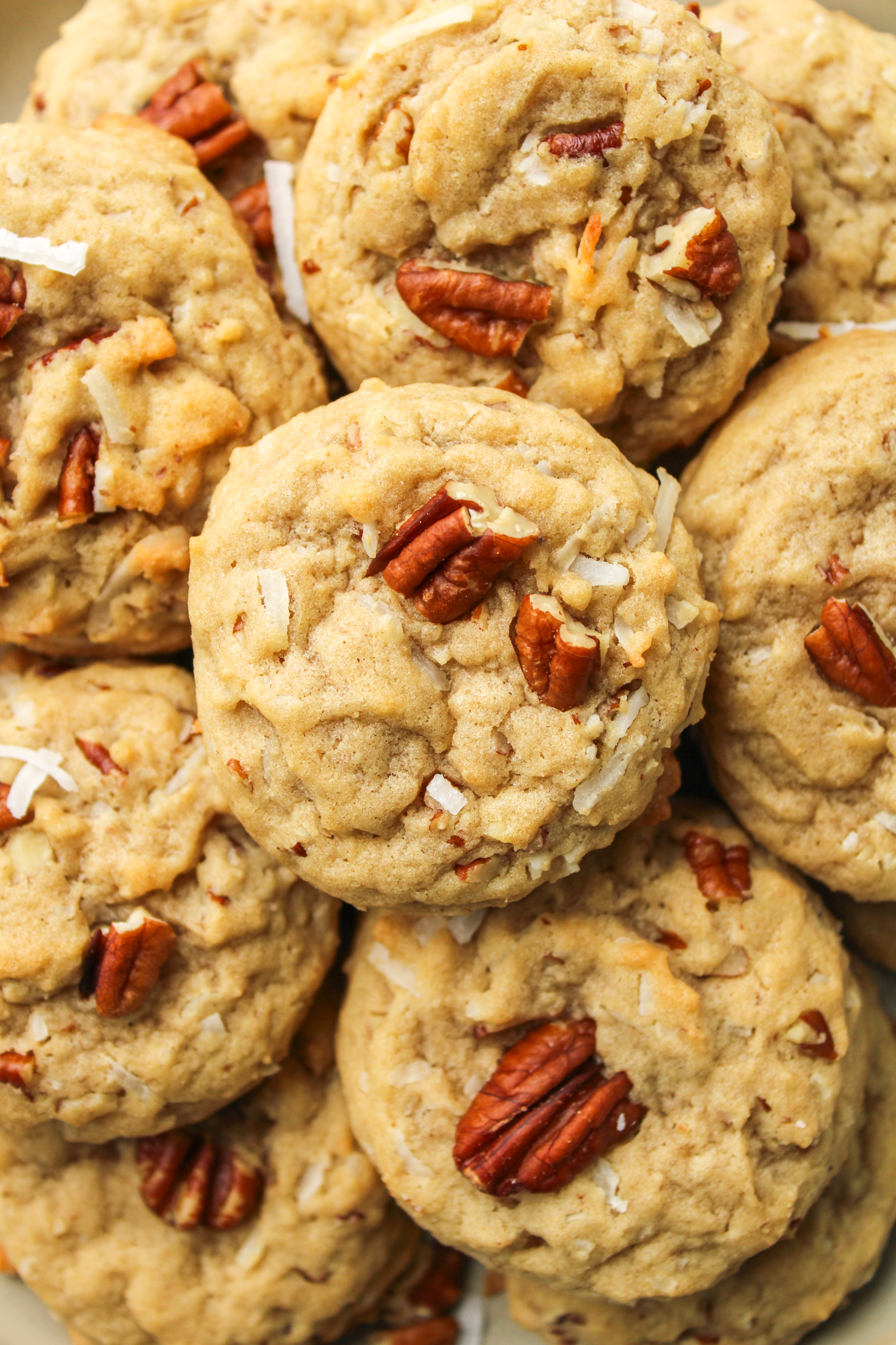 coconut pecan cookies layered on top of each other