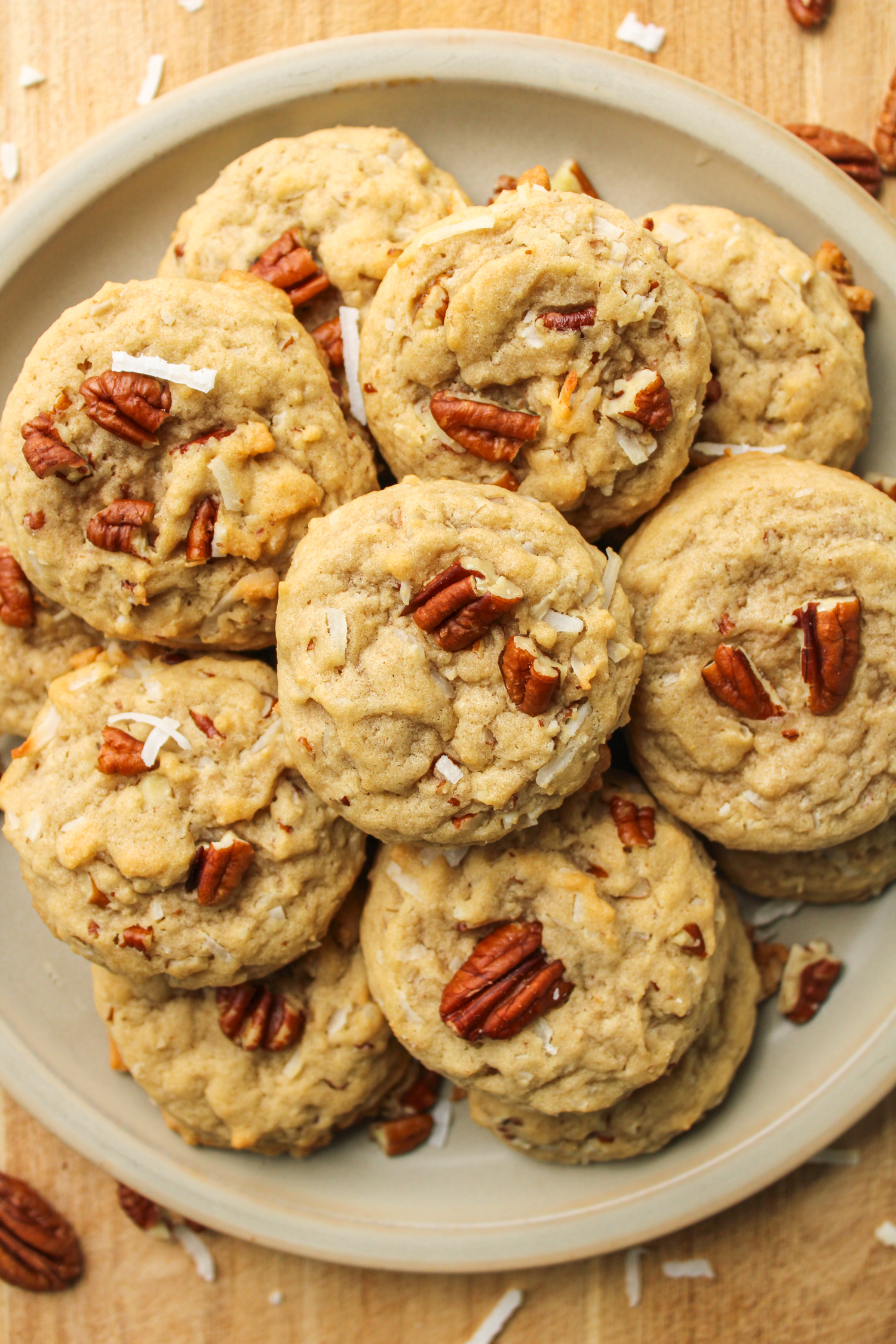 coconut pecan cookies on a grey ceramic plate