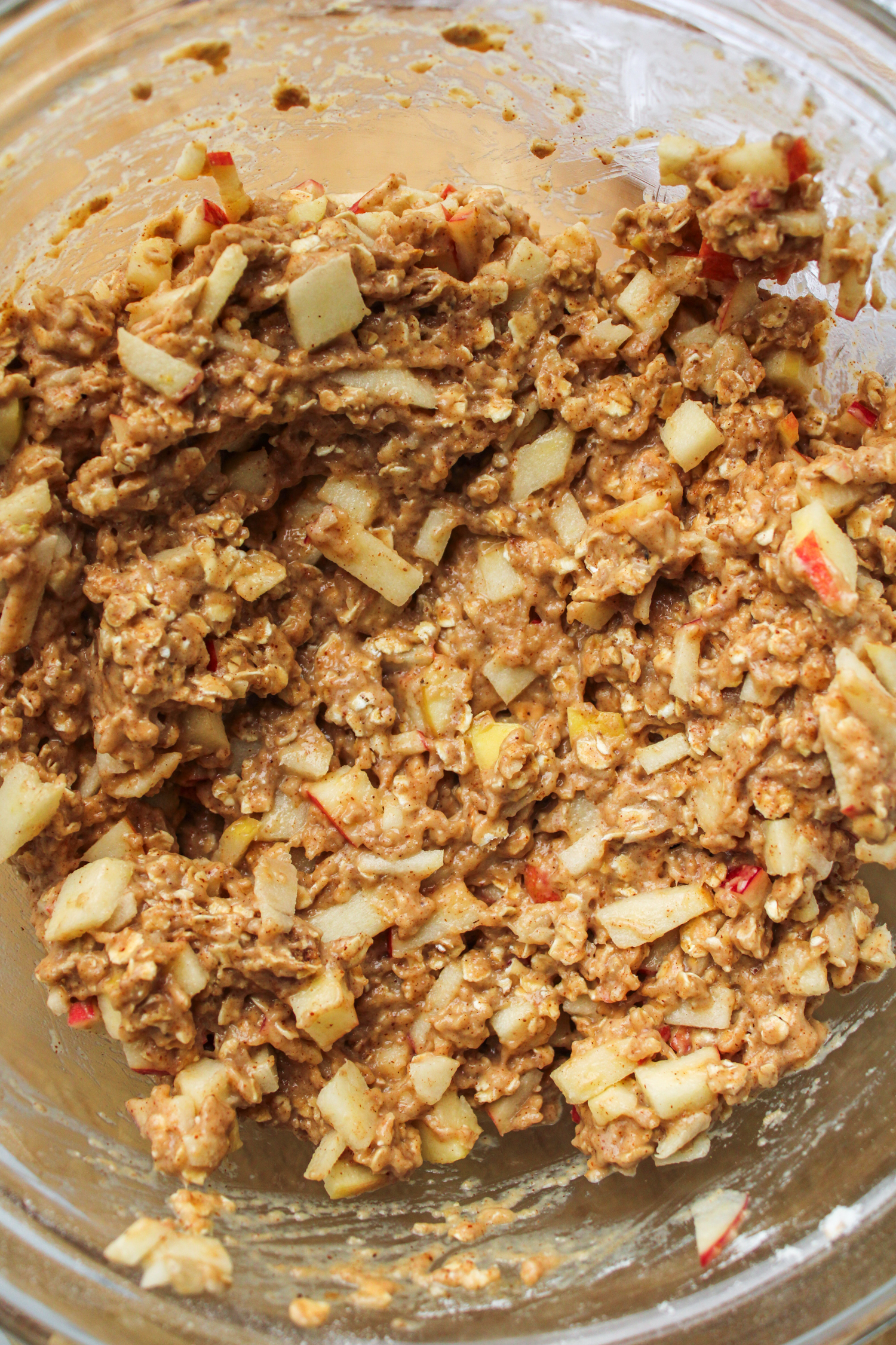 raw apple oat bar batter in a large glass bowl