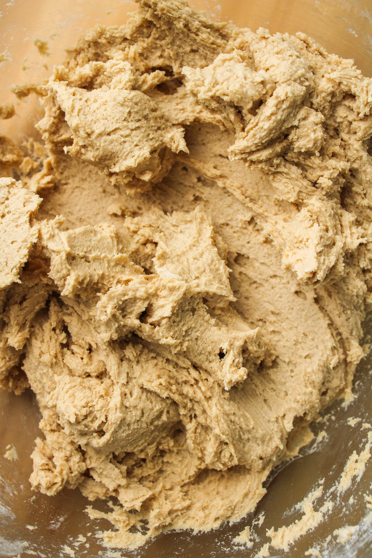 raw cookie dough in a large glass bowl