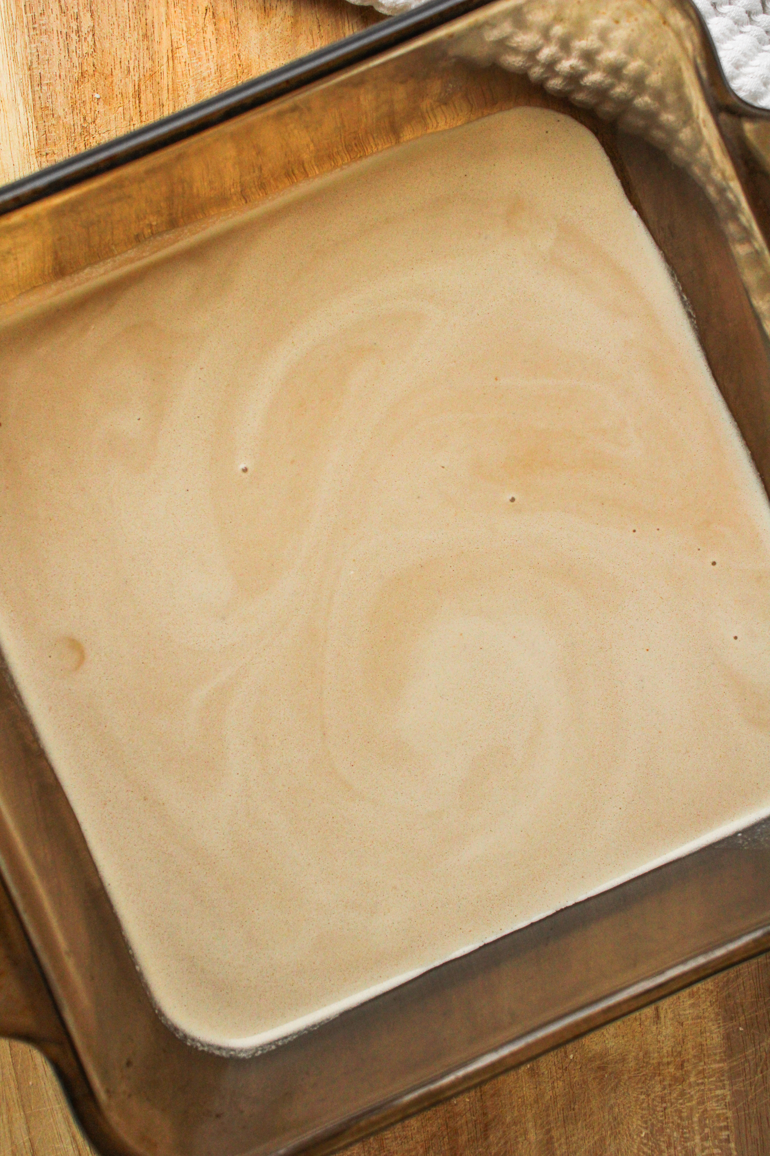 egg and milk mixture in a shallow baking dish